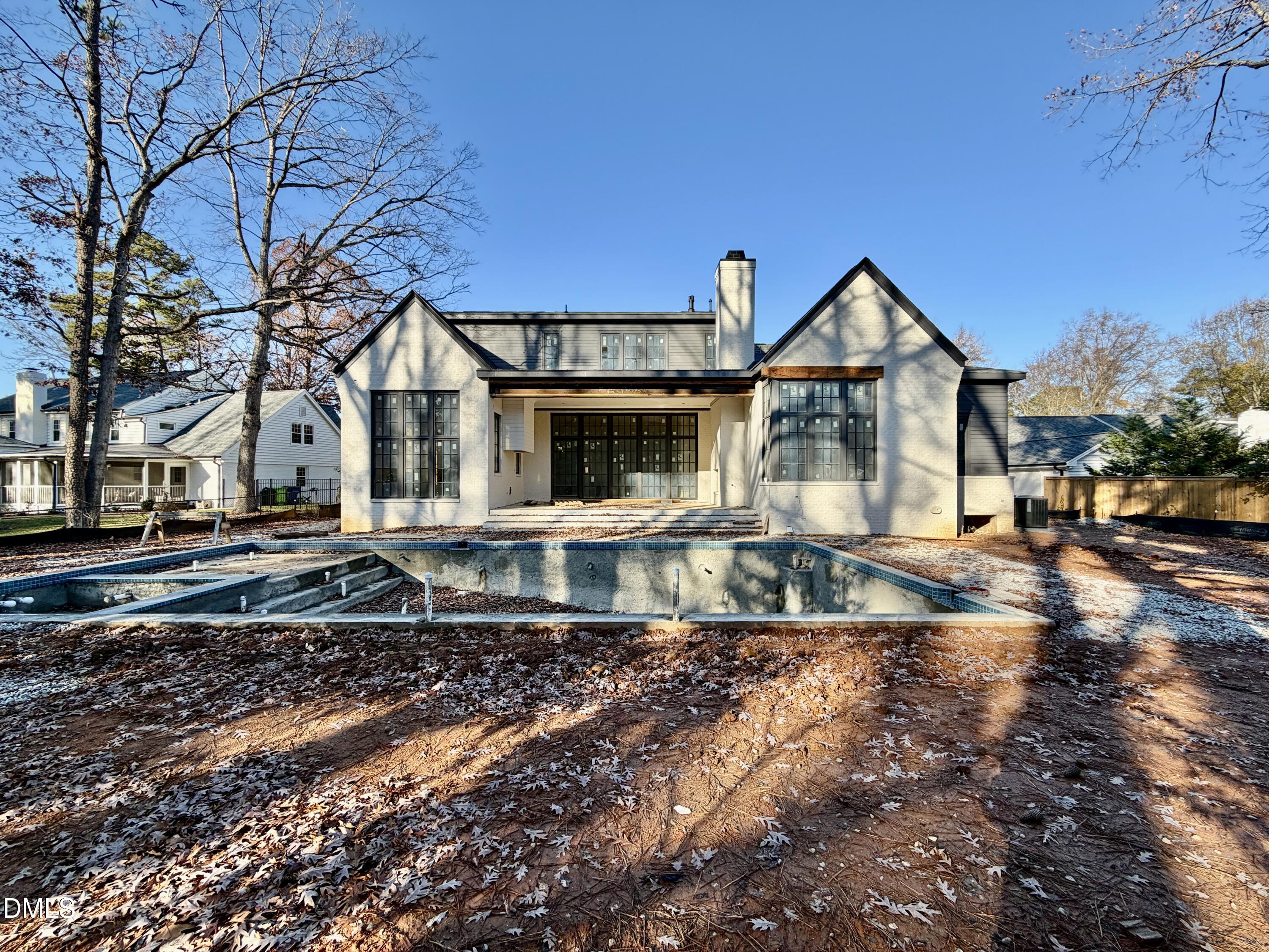 1412 Pony Run Road Raleigh, NC 27615 - Photo 38 of 42 a front view of a house with a yard