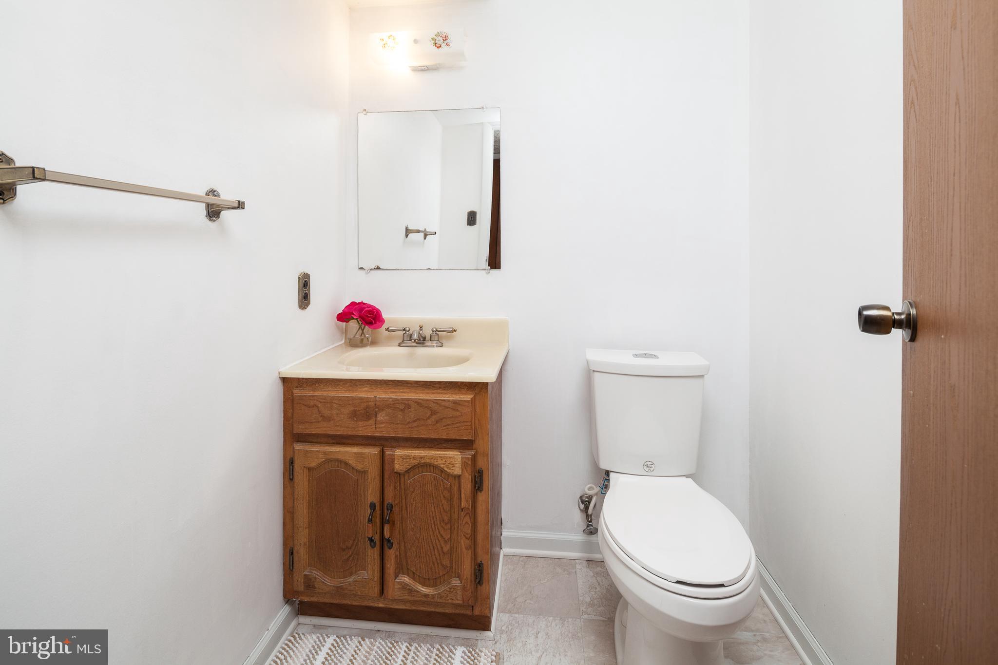 8521 Woodfall Road Baltimore, MD 21236 - Photo 16 of 21 LOWER LEVEL POWDER ROOM