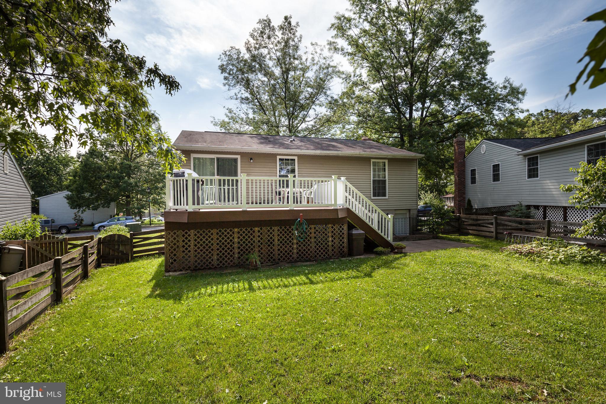 8521 Woodfall Road Baltimore, MD 21236 - Photo 20 of 21 REAR LAWN WITH FENCE
