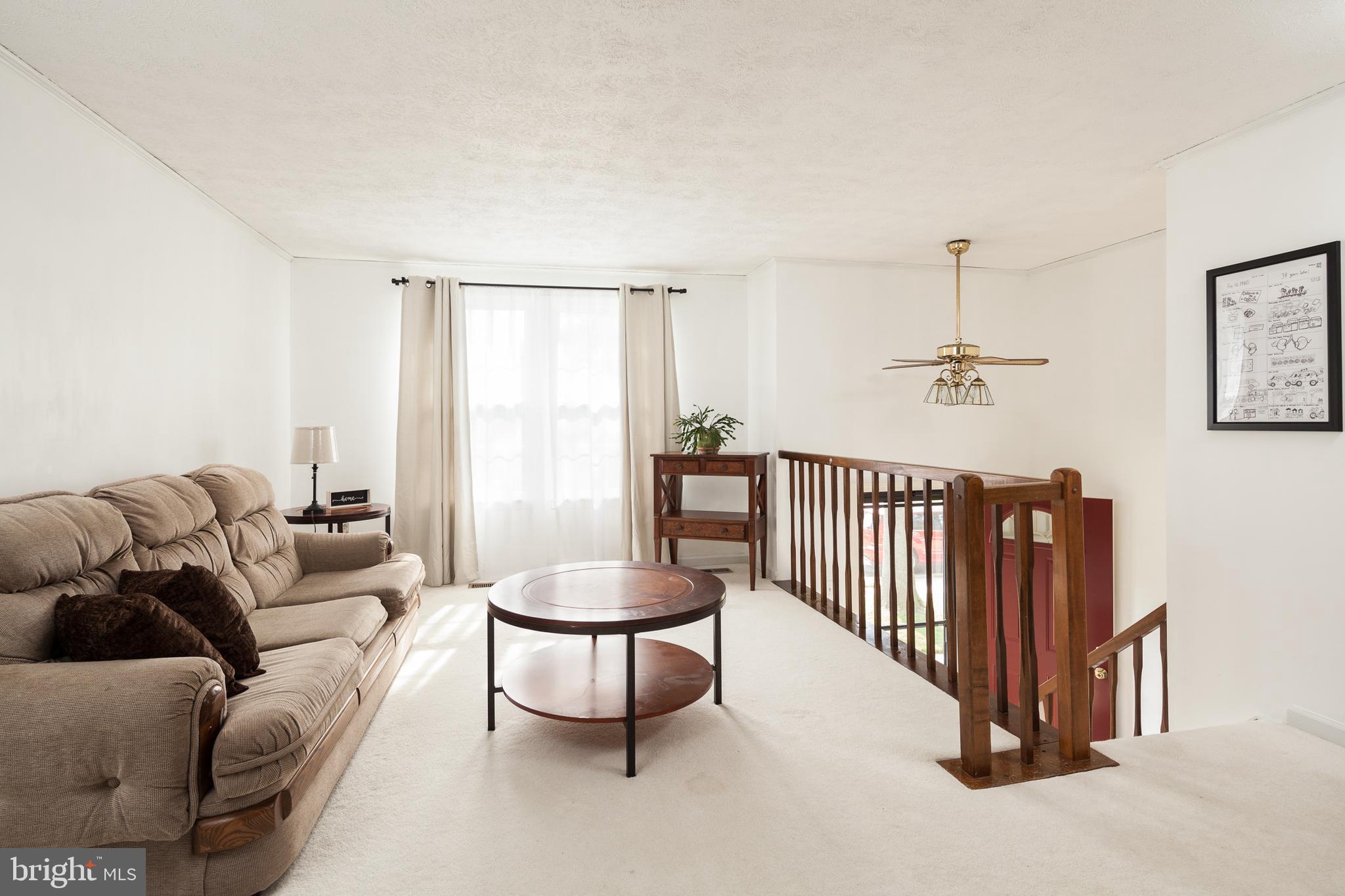 8521 Woodfall Road Baltimore, MD 21236 - Photo 3 of 21 OPEN LIVING AREA FILLED WITH NATURAL LIGHT