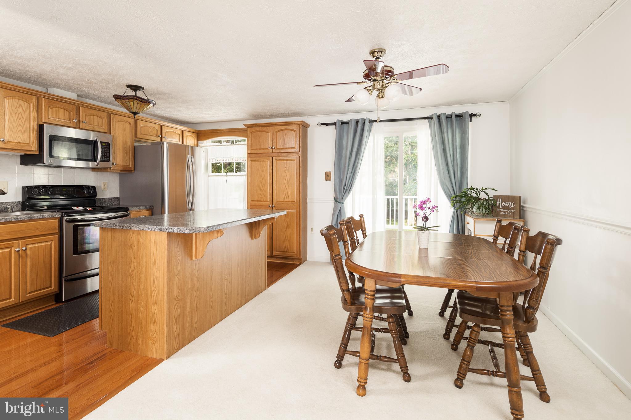 8521 Woodfall Road Baltimore, MD 21236 - Photo 5 of 21 KITCHEN WITH SEPARATE DINING AREA