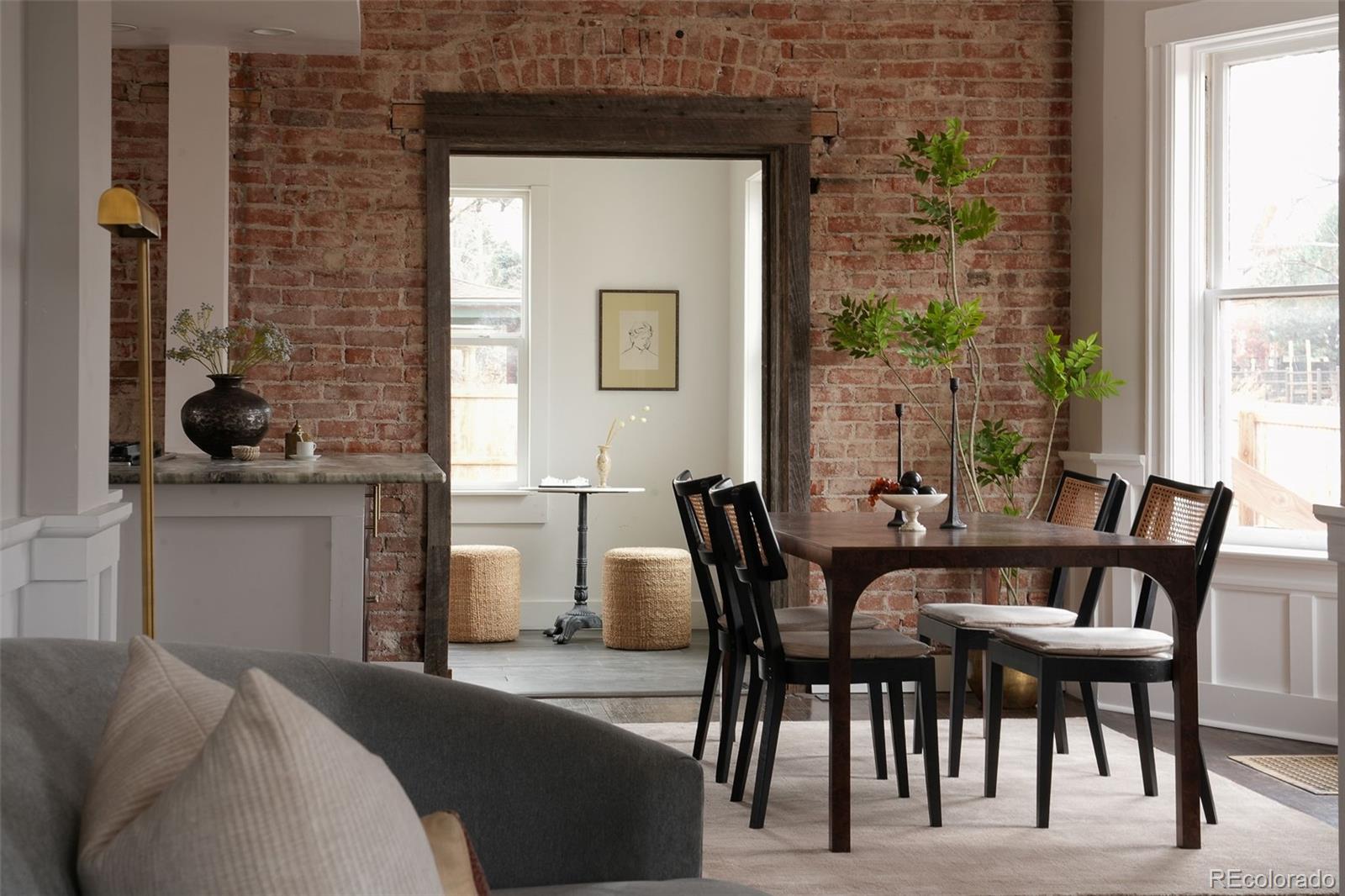 3365 Federal Boulevard Denver, CO 80211 - Photo 14 of 47 a view of a dining room with furniture and window