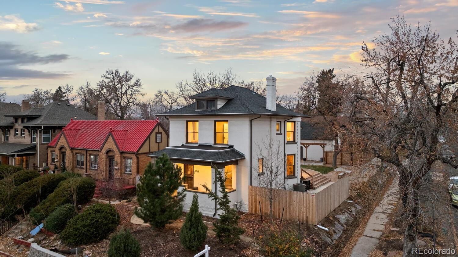 3365 Federal Boulevard Denver, CO 80211 - Photo 2 of 47 a front view of a house with yard and trees
