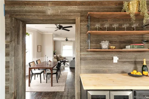 a kitchen with a stove and a refrigerator
