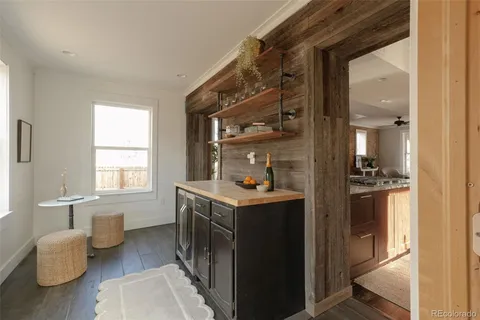 a bathroom with a sink toilet and mirror