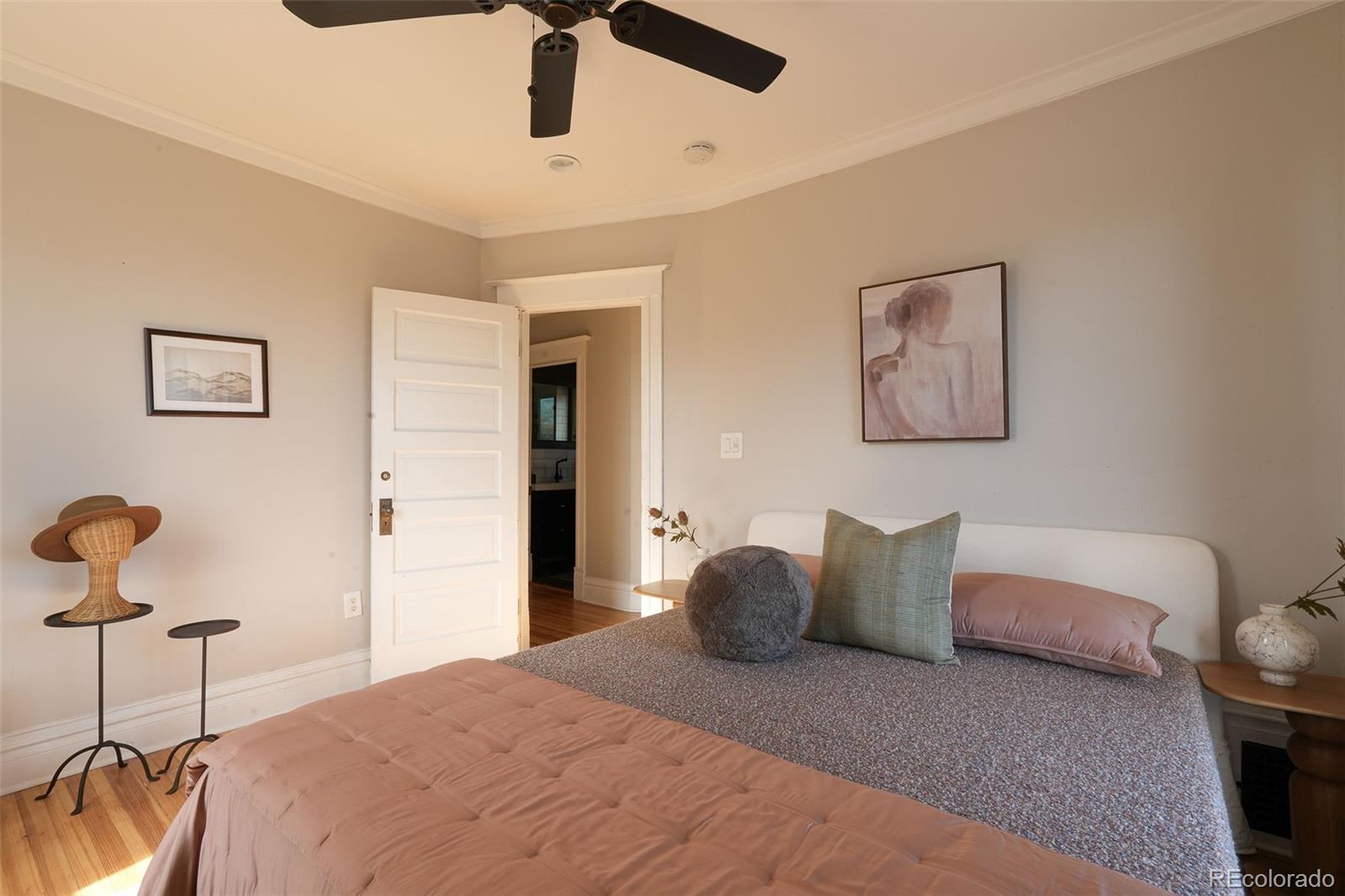 3365 Federal Boulevard Denver, CO 80211 - Photo 28 of 47 a bedroom with a bed and cabinets