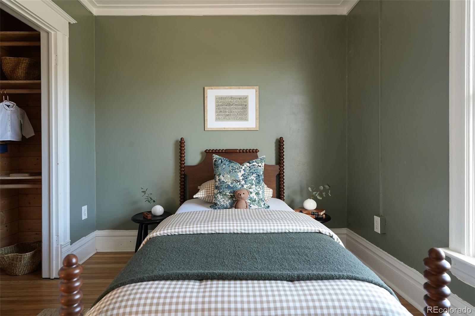 3365 Federal Boulevard Denver, CO 80211 - Photo 33 of 47 a large bed in a bedroom next to a window