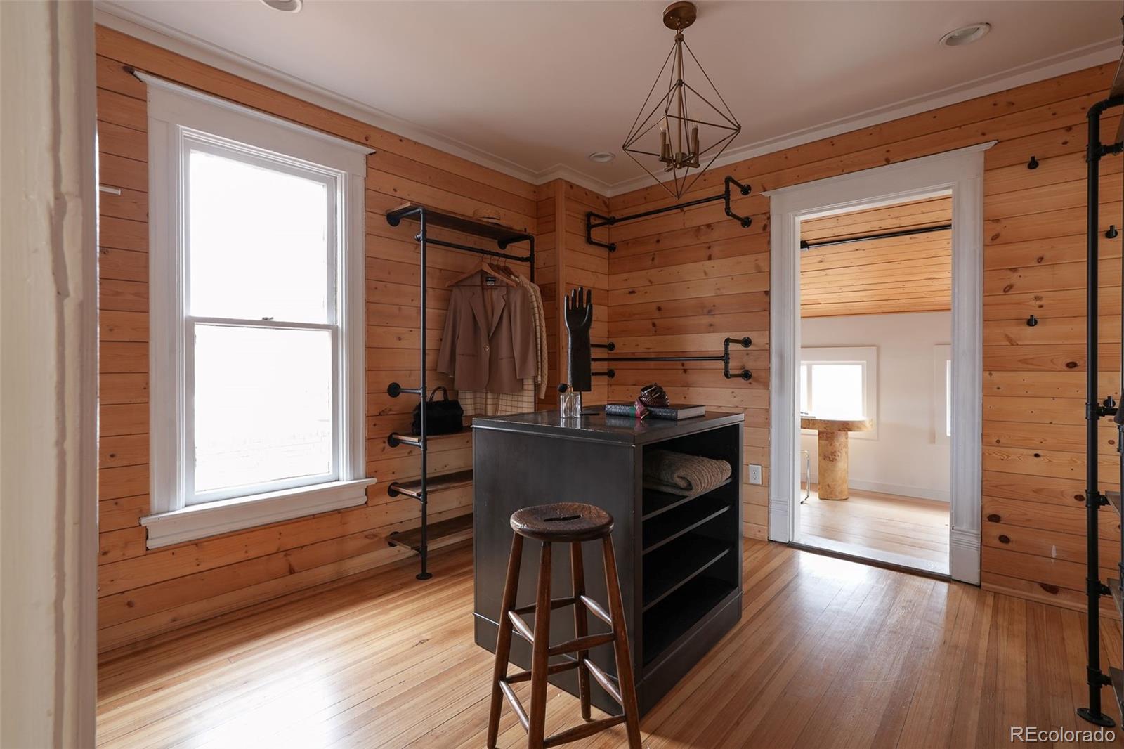 3365 Federal Boulevard Denver, CO 80211 - Photo 36 of 47 a view of a livingroom with furniture and wooden floor