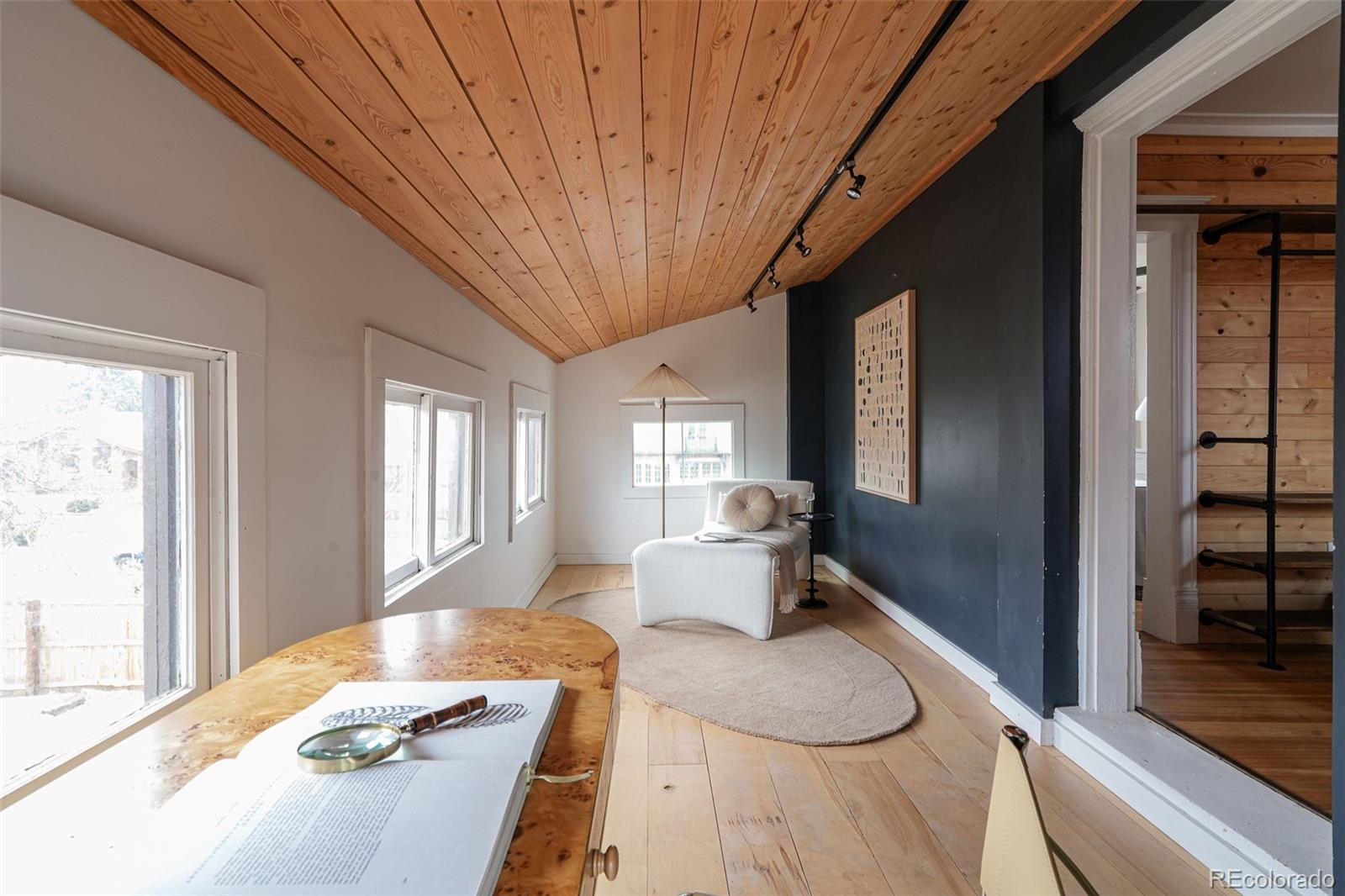 3365 Federal Boulevard Denver, CO 80211 - Photo 39 of 47 a living room with furniture and a large window
