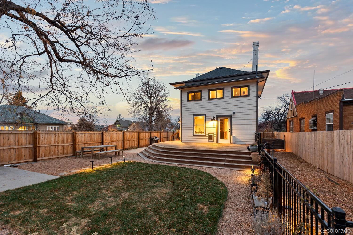 3365 Federal Boulevard Denver, CO 80211 - Photo 44 of 47 a front view of a house with a yard