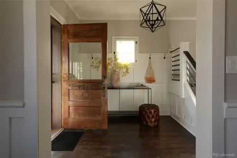 a view of a hallway with front door