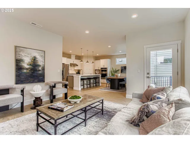 a living room with furniture and a table