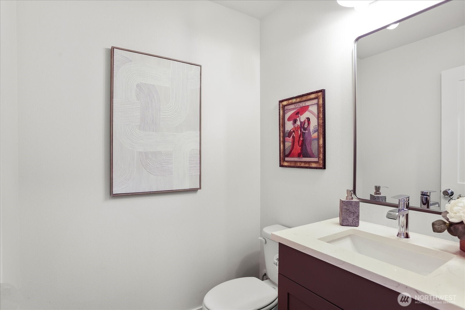 121 171st Place Southwest, Unit B Bothell, WA 98012 - Photo 16 of 36 a bathroom with a toilet sink and mirror