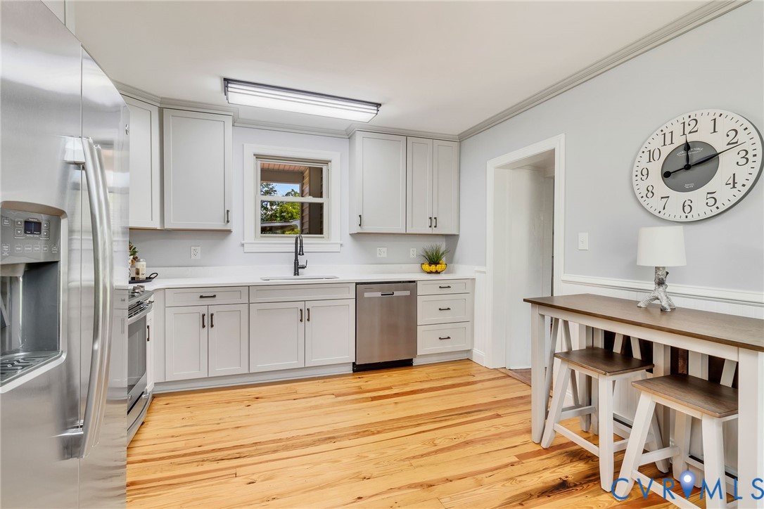618 Main Street Reedville, VA 22539 - Photo 14 of 54 Kitchen featuring wood flooring, light gray cabin