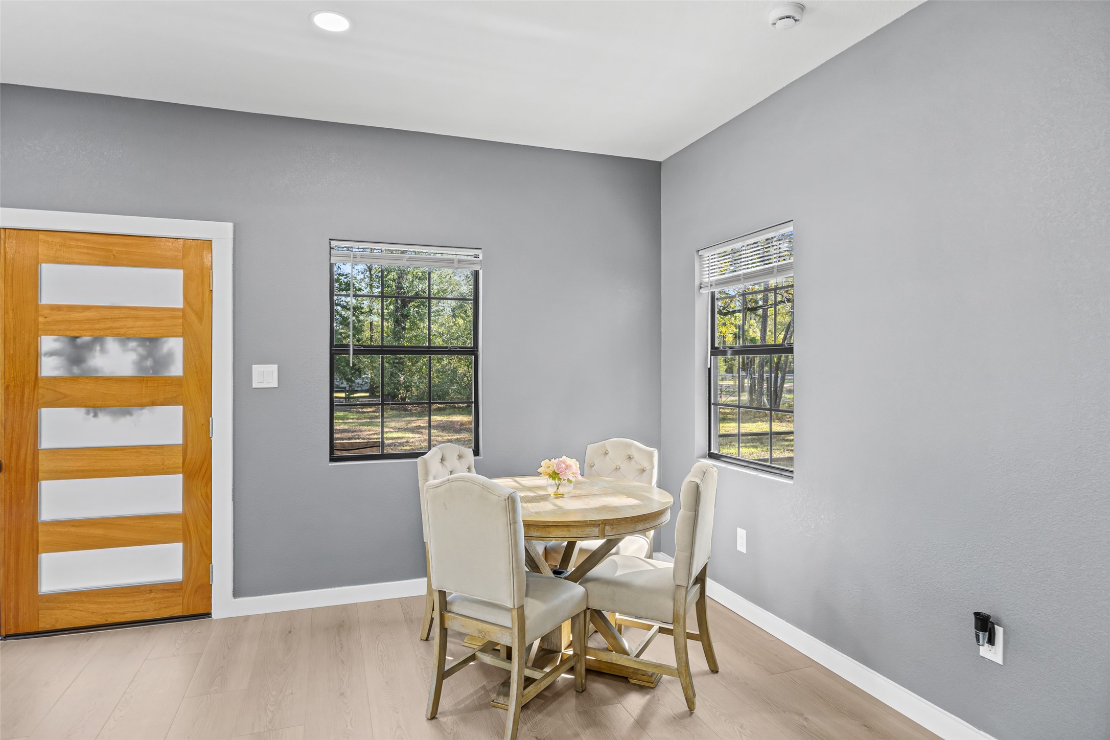 15080 Usher Lane Splendora, TX 77372 - Photo 14 of 44 a dining room with furniture and window
