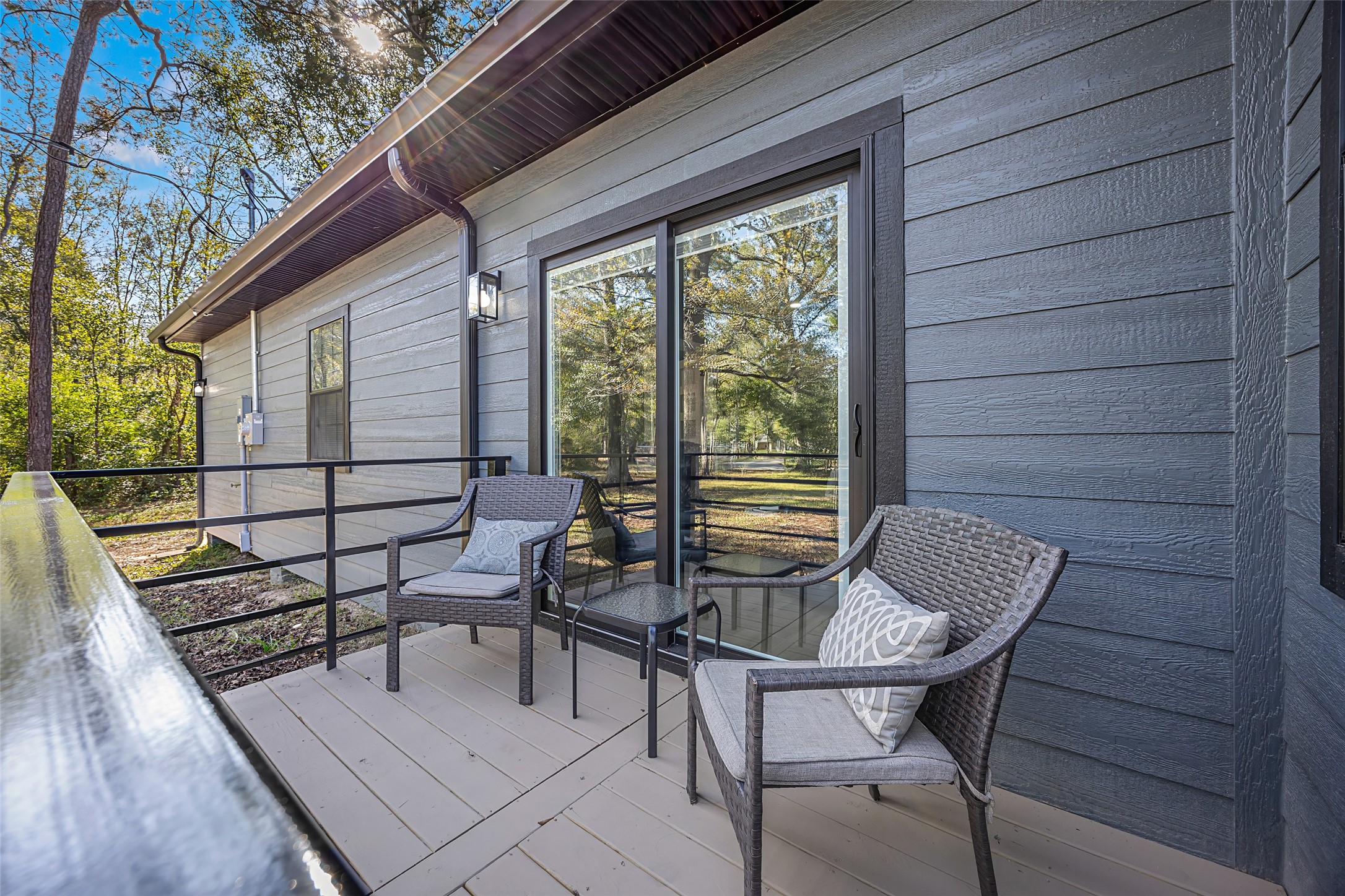 15080 Usher Lane Splendora, TX 77372 - Photo 25 of 44 a view of a patio with wooden floor