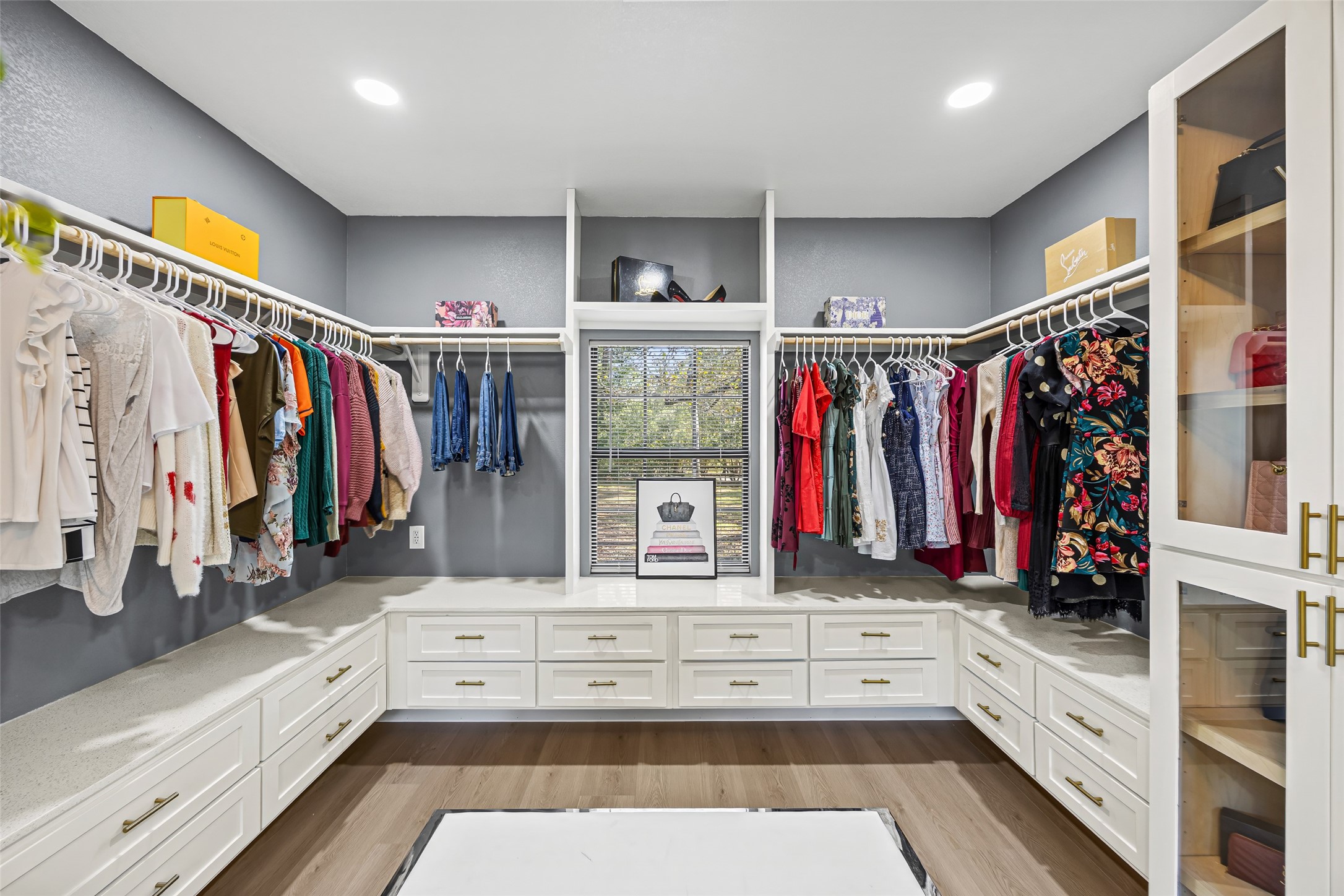15080 Usher Lane Splendora, TX 77372 - Photo 27 of 44 a view of walk in closet with clothes and shoes