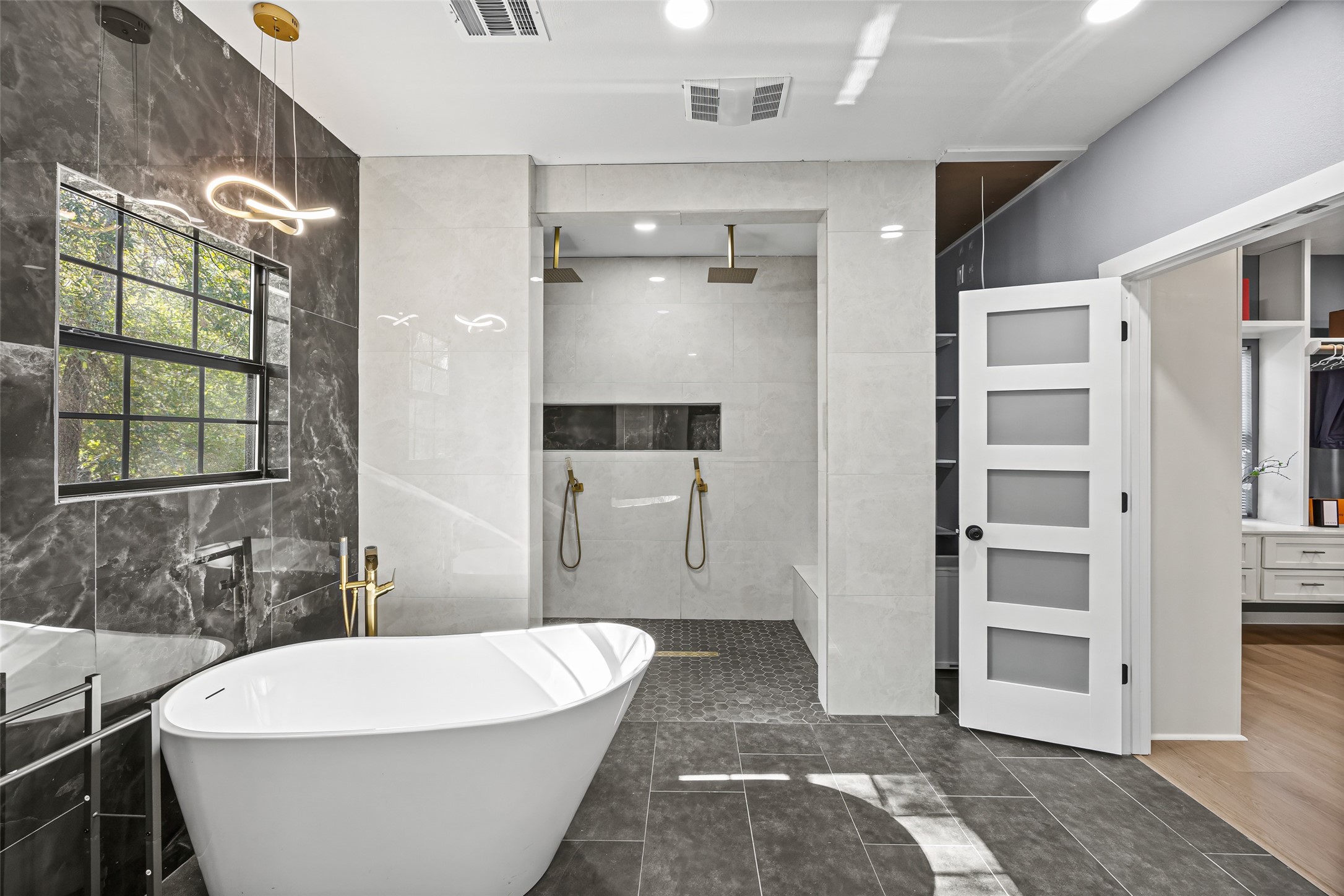 15080 Usher Lane Splendora, TX 77372 - Photo 32 of 44 a bathroom with a white tub and shower