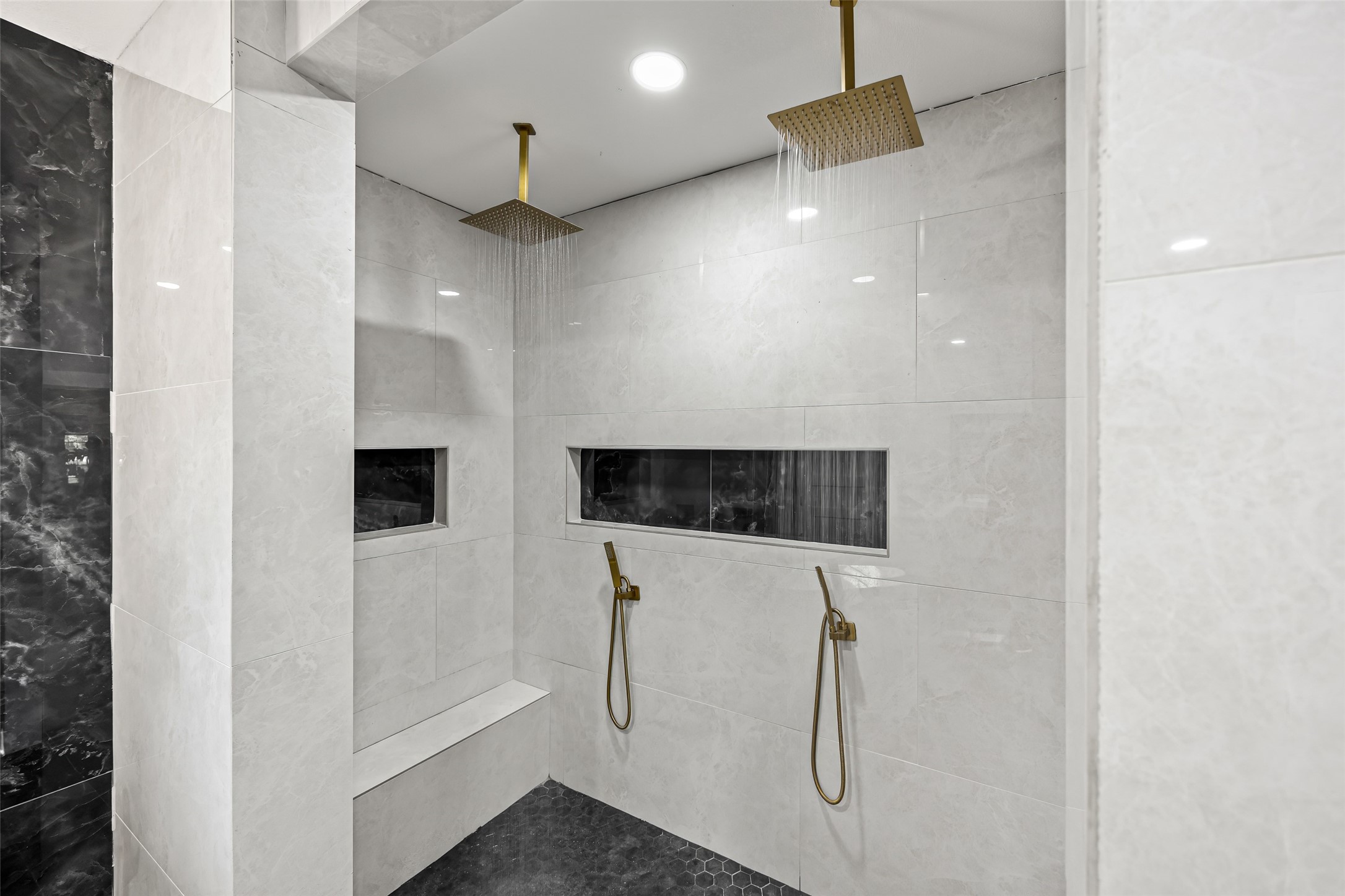 15080 Usher Lane Splendora, TX 77372 - Photo 33 of 44 a bathroom with a shower and a mirror