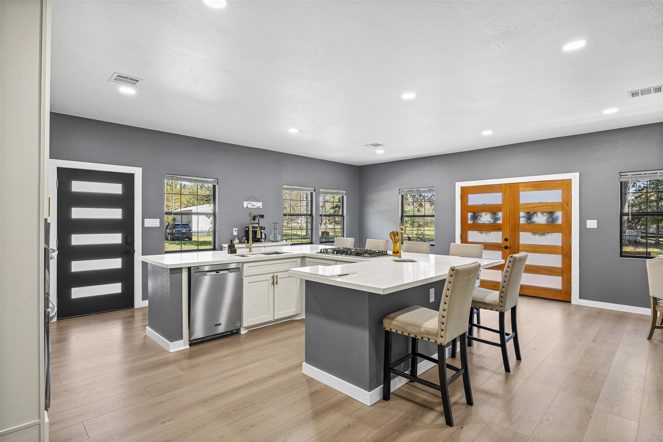 15080 Usher Lane Splendora, TX 77372 - Photo 4 of 44 a kitchen with a table and chairs in it