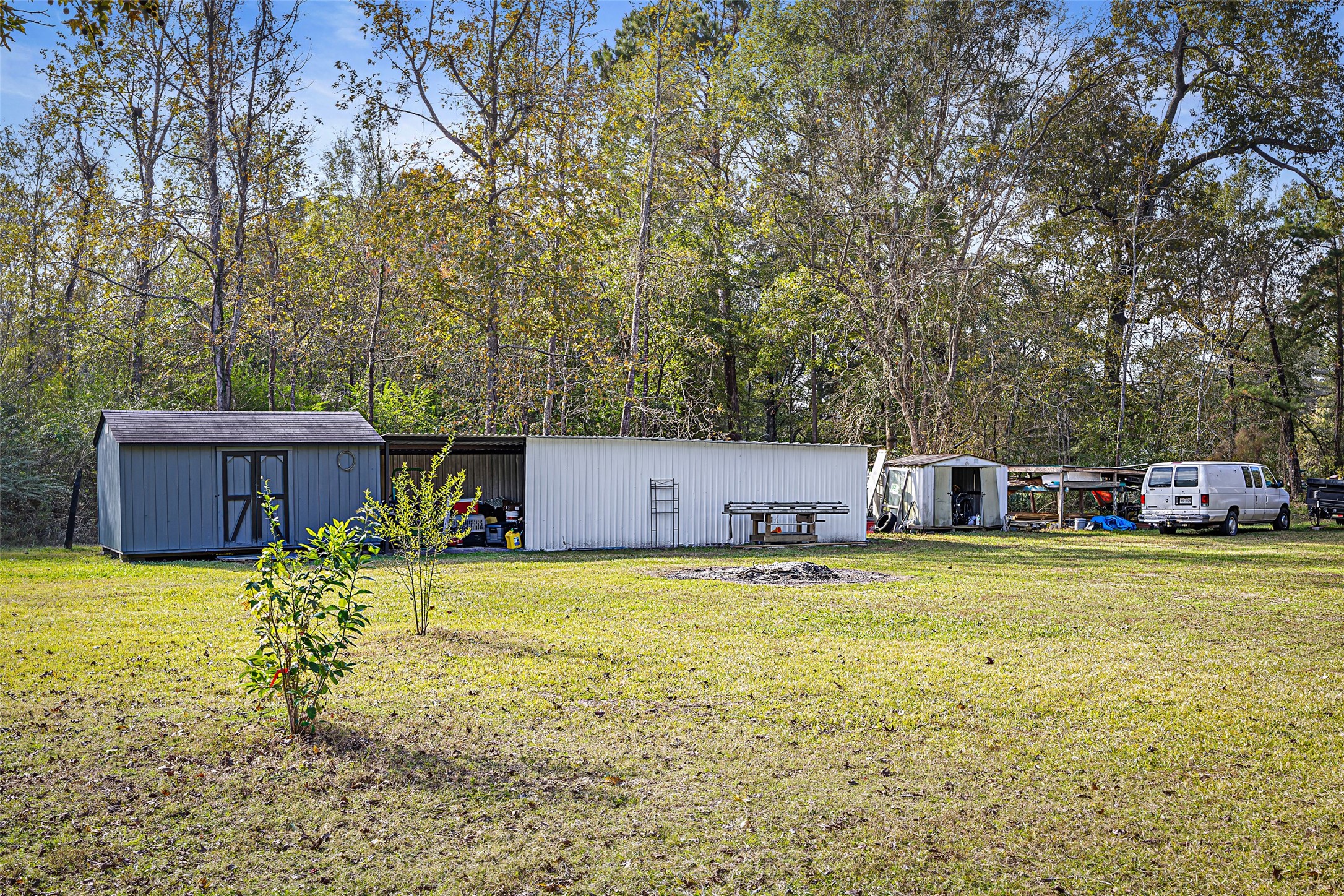 15080 Usher Lane Splendora, TX 77372 - Photo 9 of 44 a house view with a sitting space and garden space