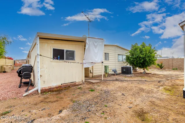 a house view with a backyard space