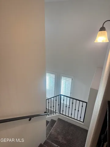 a bathroom with a double vanity sink and mirror