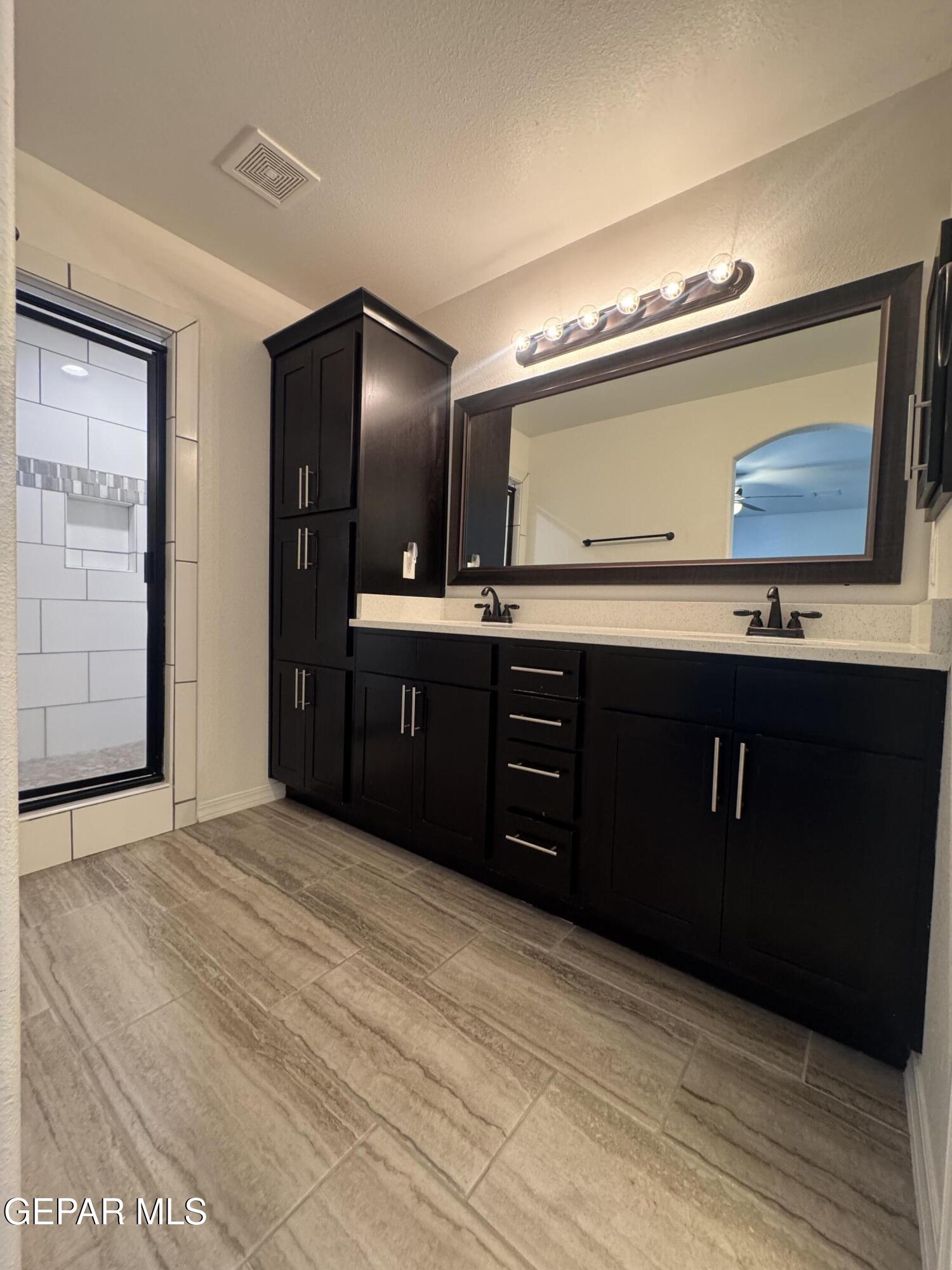 412 Indigo Court El Paso, TX 79932 - Photo 32 of 53 a kitchen with stainless steel appliances granite countertop cabinets and window