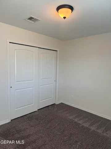 a view of entryway with a front door