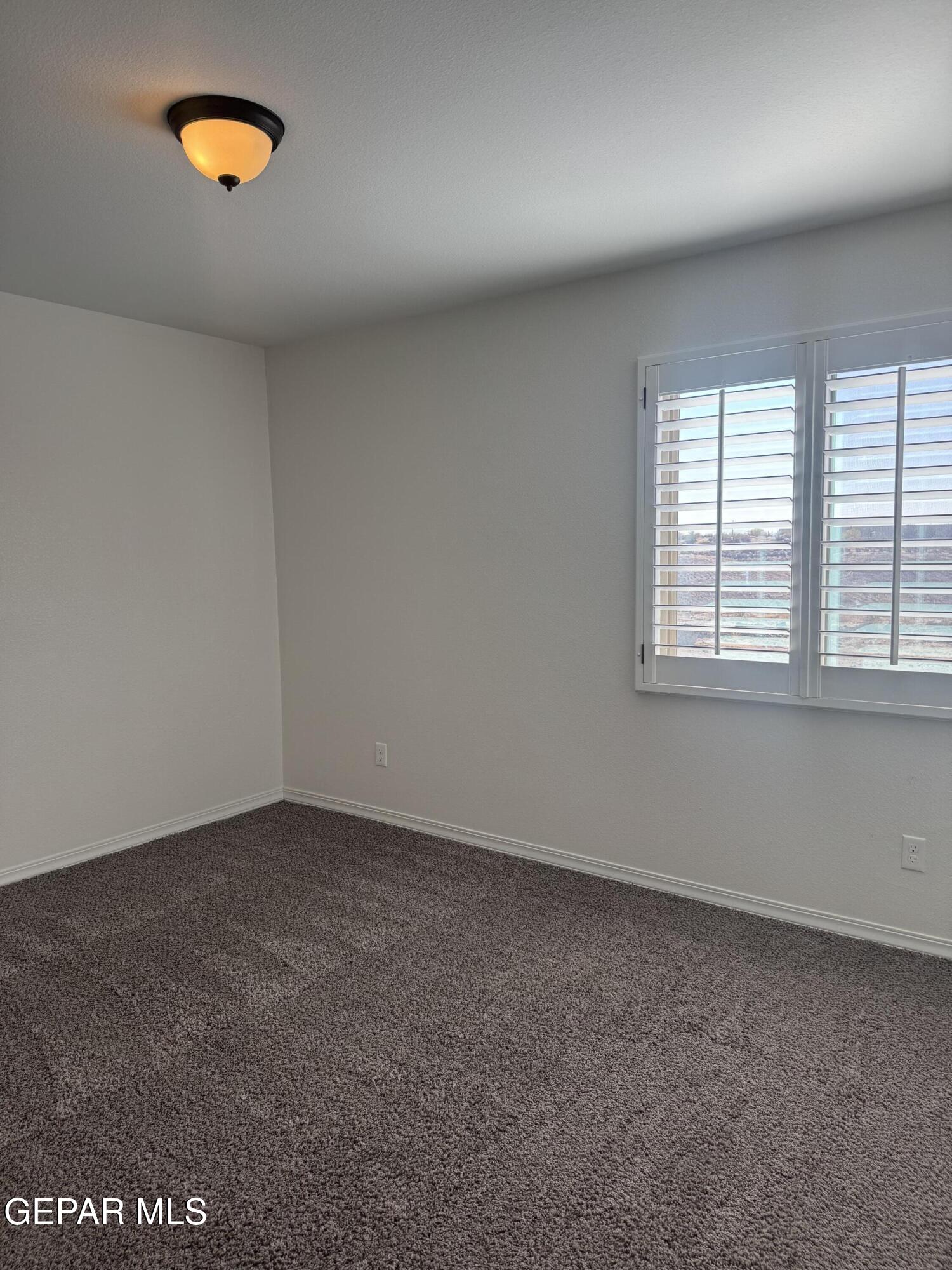 412 Indigo Court El Paso, TX 79932 - Photo 42 of 53 an empty room with a window