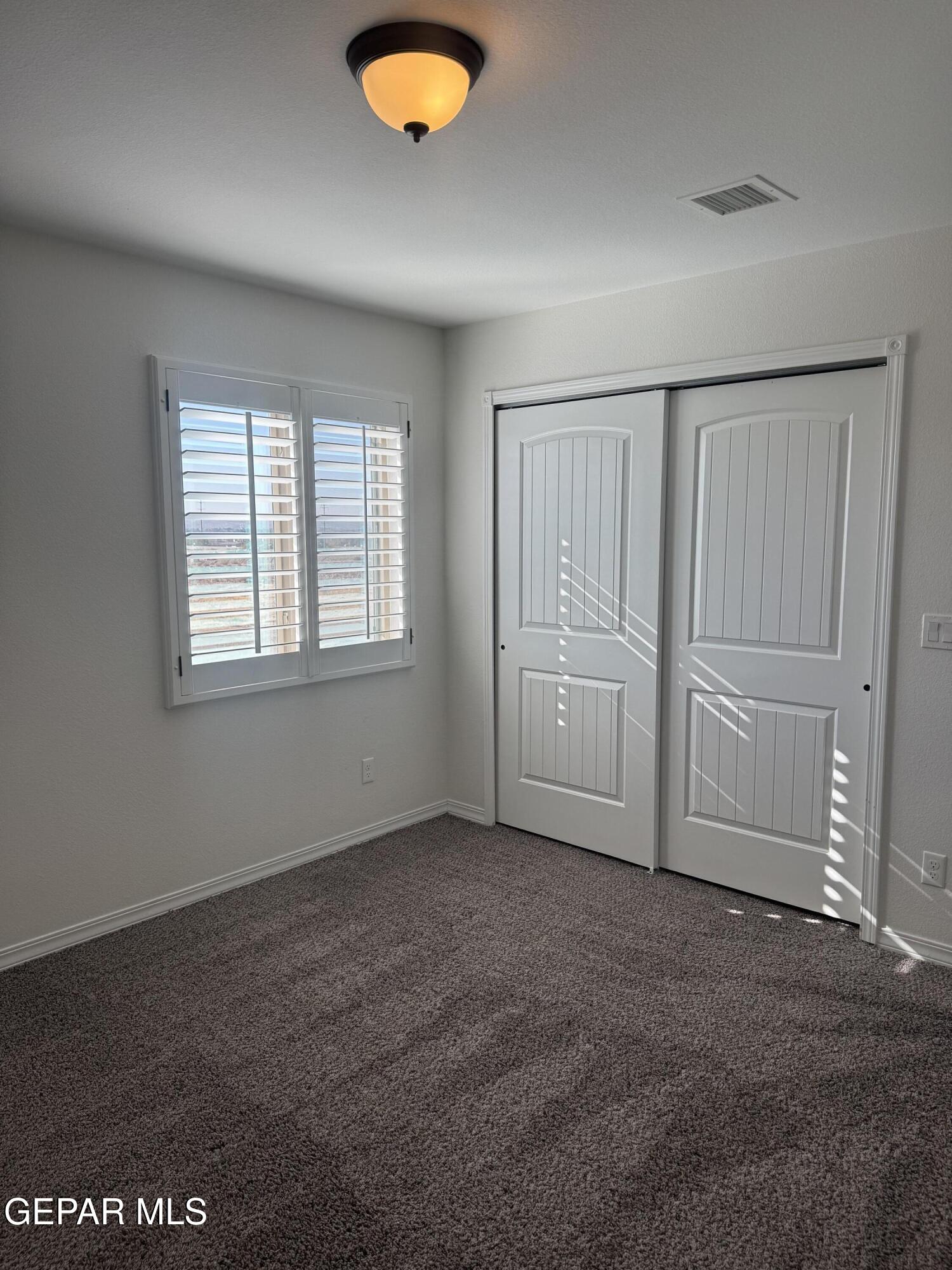 412 Indigo Court El Paso, TX 79932 - Photo 43 of 53 an empty room with windows