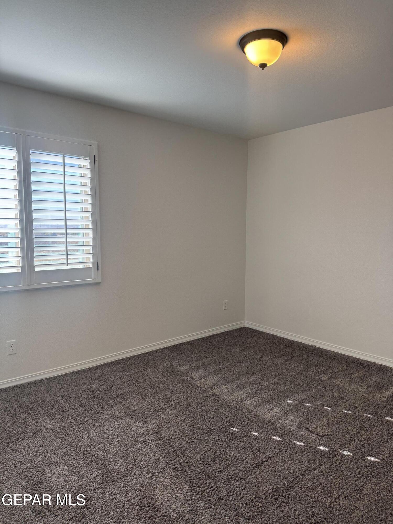 412 Indigo Court El Paso, TX 79932 - Photo 44 of 53 an empty room with a window