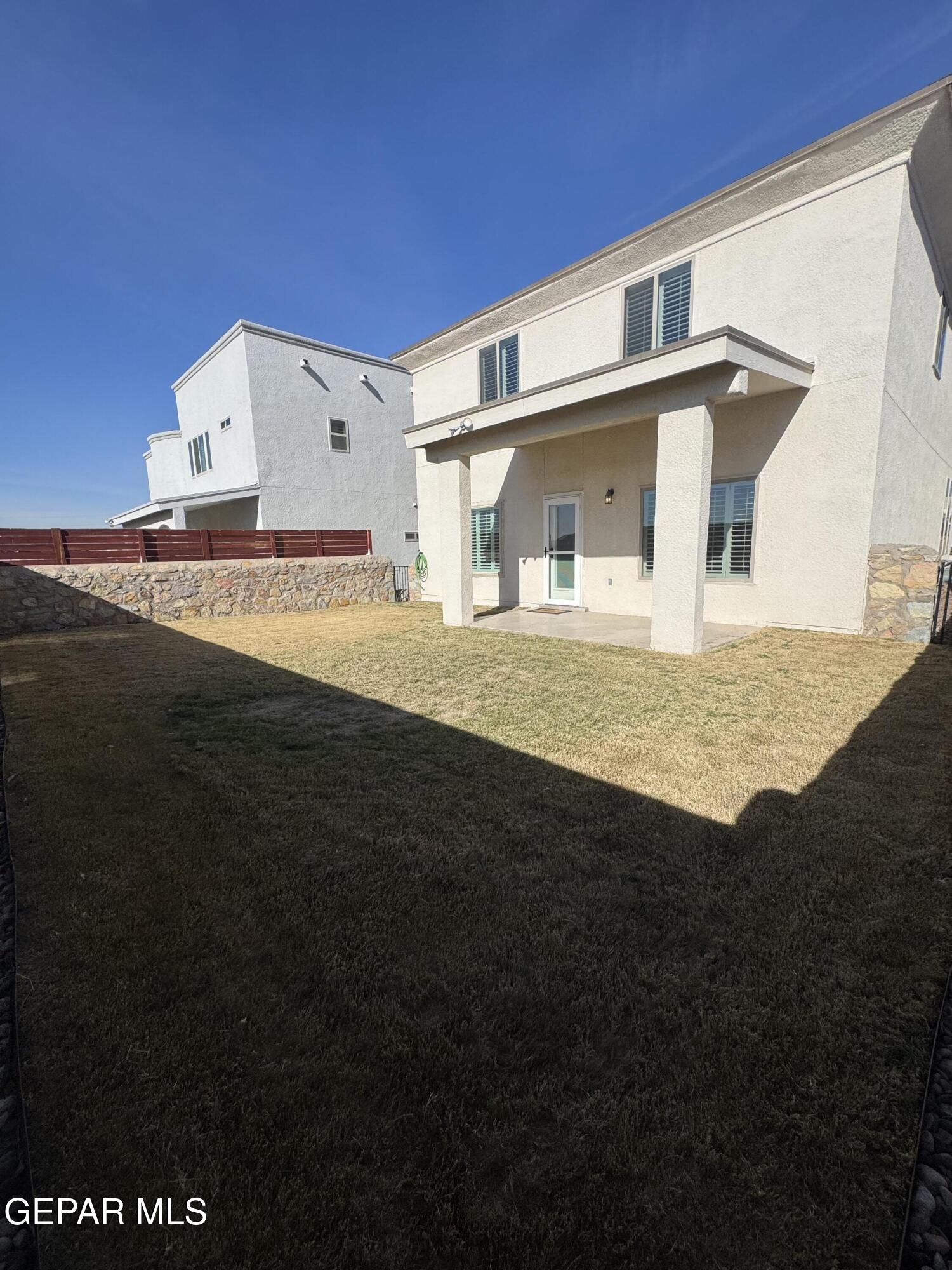 412 Indigo Court El Paso, TX 79932 - Photo 48 of 53 a front view of a house with a yard