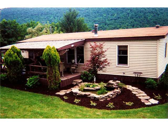 166 Wetherby Road Italy, NY 14512 - Photo 1 of 1 Exterior Front. Delightful nature bound property o