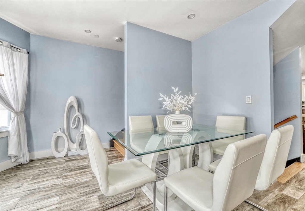 61 Shepton Street Boston, MA 02124 - Photo 18 of 38 a view of a dining room with furniture