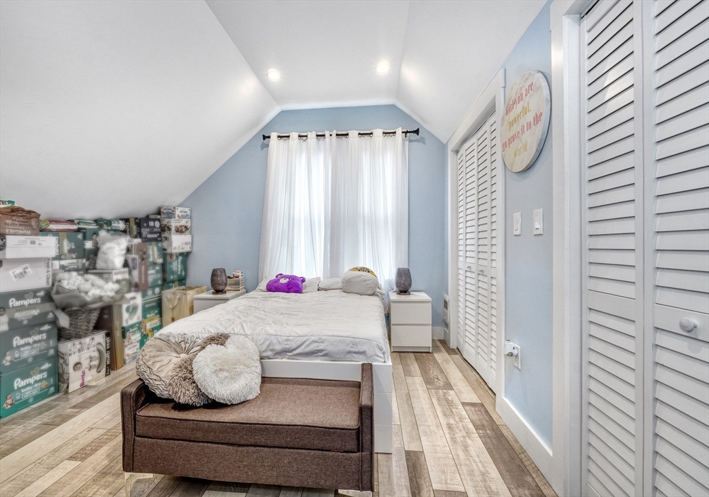 61 Shepton Street Boston, MA 02124 - Photo 23 of 38 a room with furniture and a rug