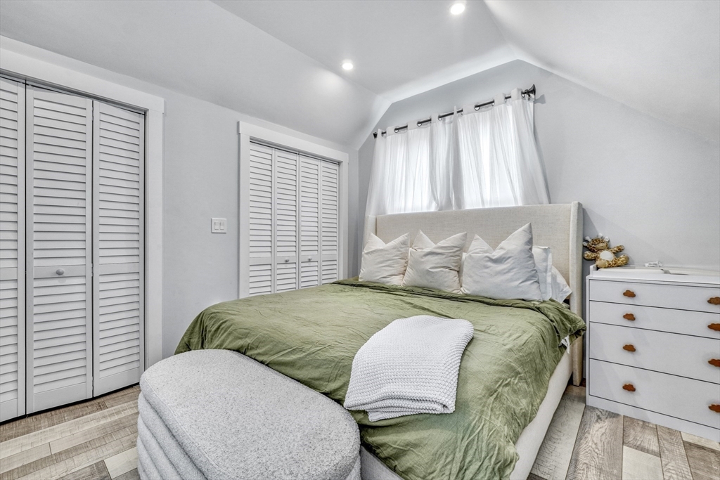 61 Shepton Street Boston, MA 02124 - Photo 25 of 38 a bedroom with a bed and a window