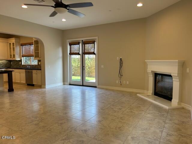 5200 Breakers Way Oxnard, CA 93035 - Photo 26 of 75 a view of an empty room with a fireplace and a window