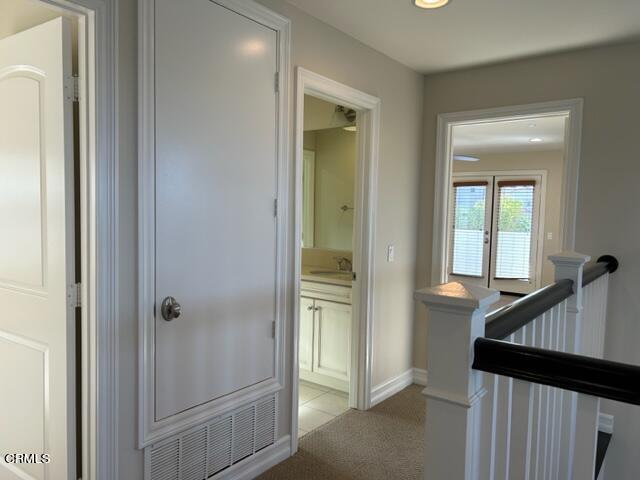 5200 Breakers Way Oxnard, CA 93035 - Photo 50 of 75 a view of a hallway with a elevator