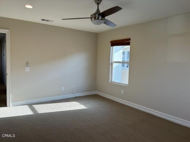 5200 Breakers Way Oxnard, CA 93035 - Photo 56 of 75 an empty room with a window and a ceiling fan