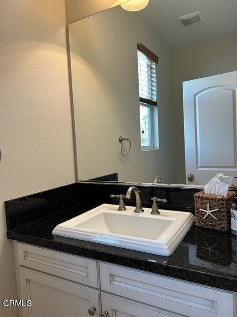5200 Breakers Way Oxnard, CA 93035 - Photo 8 of 75 a sink sitting next to a bathroom