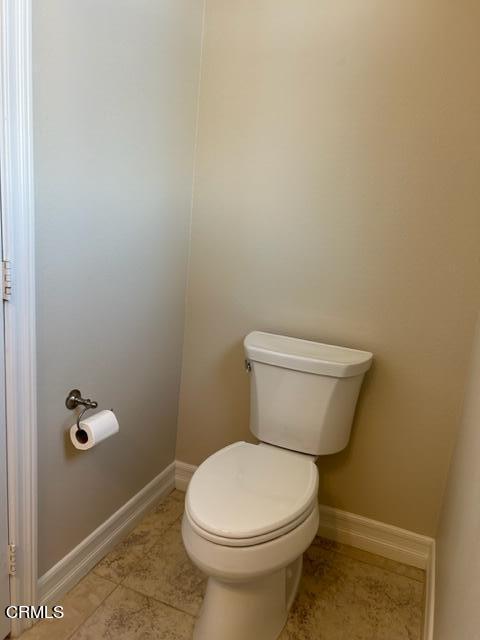 5200 Breakers Way Oxnard, CA 93035 - Photo 9 of 75 a white toilet sitting next to a white wall
