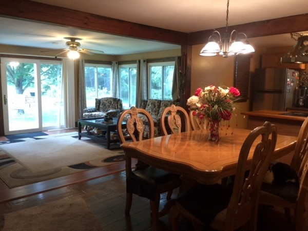 33 Strowbridge Road Northfield, MA 01360 - Photo 2 of 19 a view of a dining room with furniture and chandelier