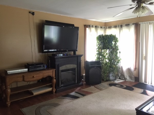 33 Strowbridge Road Northfield, MA 01360 - Photo 5 of 19 a living room with furniture and a flat screen tv