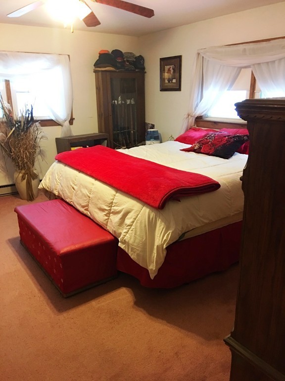 33 Strowbridge Road Northfield, MA 01360 - Photo 7 of 19 a bedroom with a bed and window