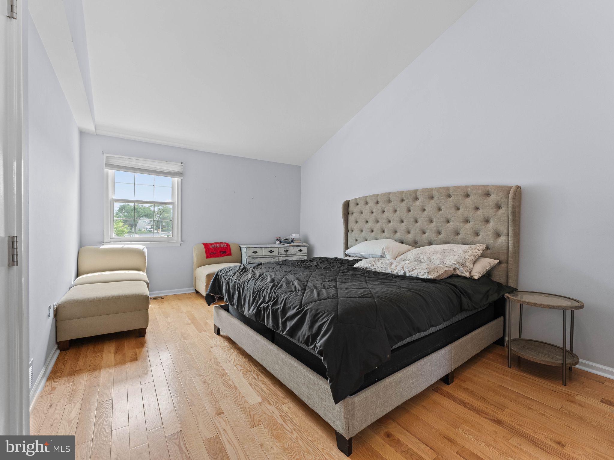 8 Chesterfield Road Sewell, NJ 08080 - Photo 22 of 57 a bedroom with a bed couch and a window