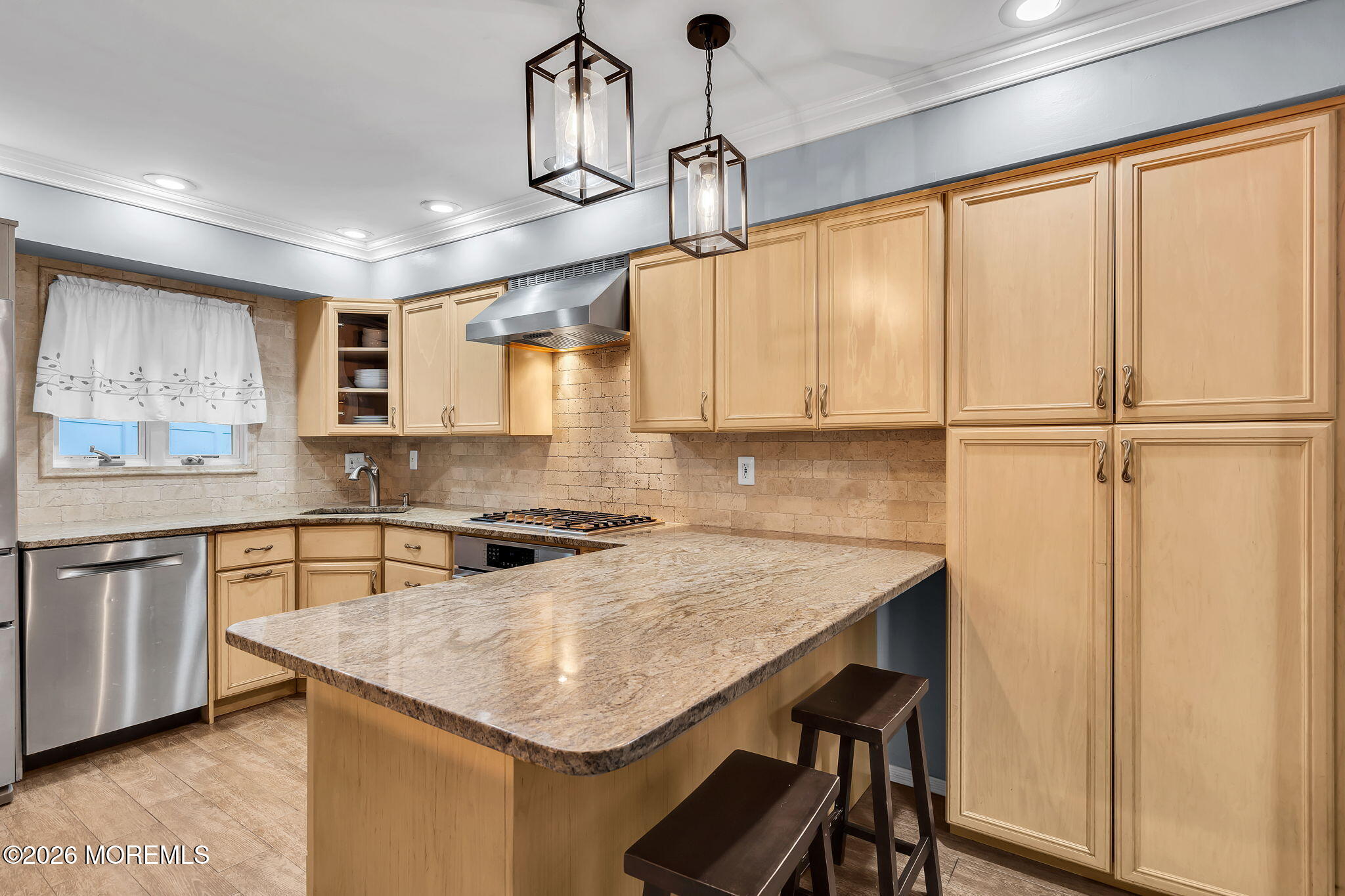 26 North Westfield Road Howell, NJ 07731 - Photo 16 of 59 a kitchen with a center island appliances and cabinets