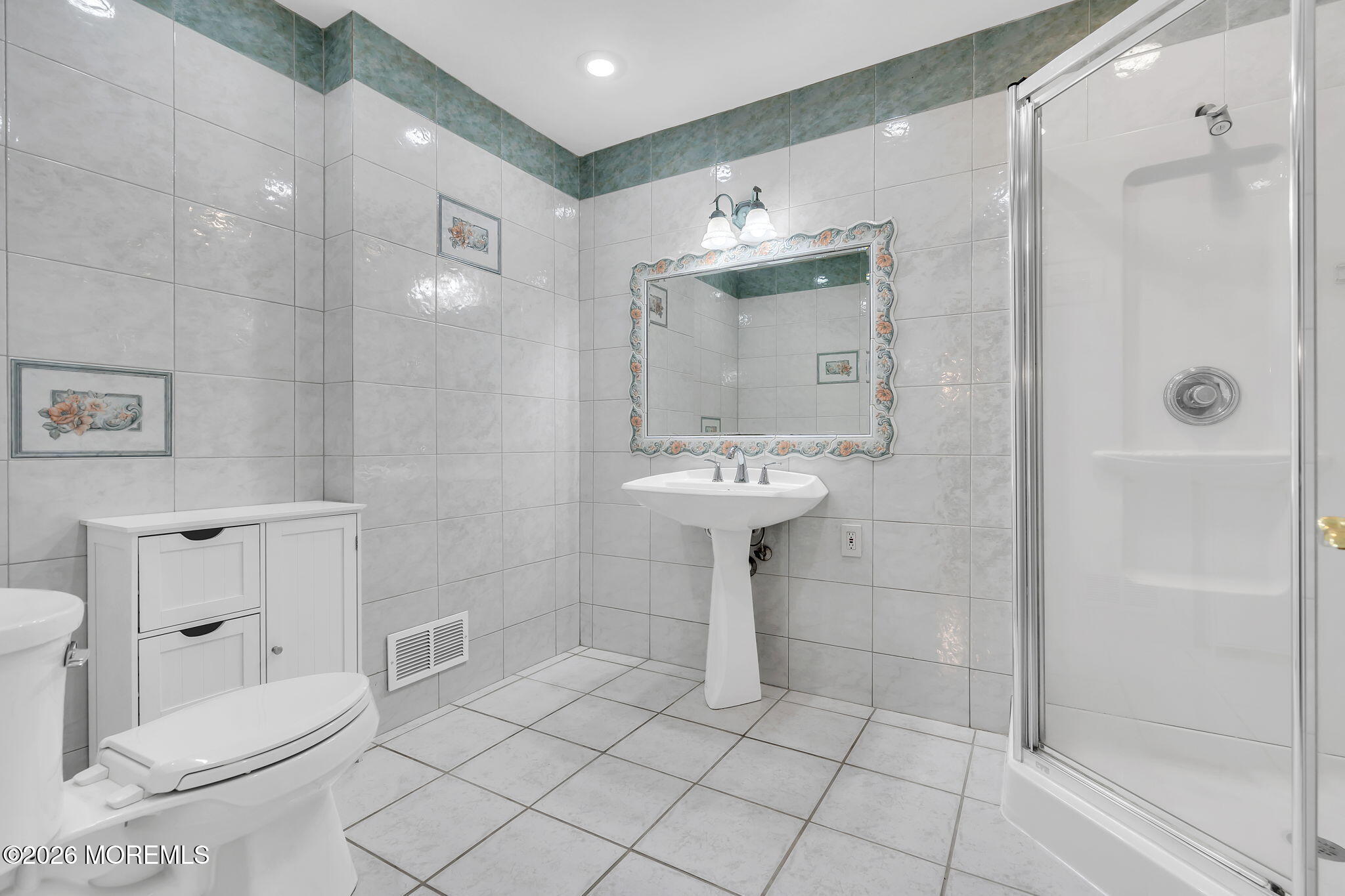 26 North Westfield Road Howell, NJ 07731 - Photo 19 of 59 a bathroom with a sink toilet and shower