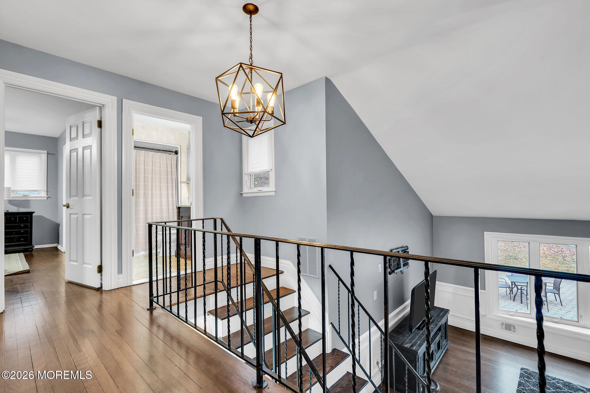 26 North Westfield Road Howell, NJ 07731 - Photo 25 of 59 a view of a hallway with wooden floor and staircase