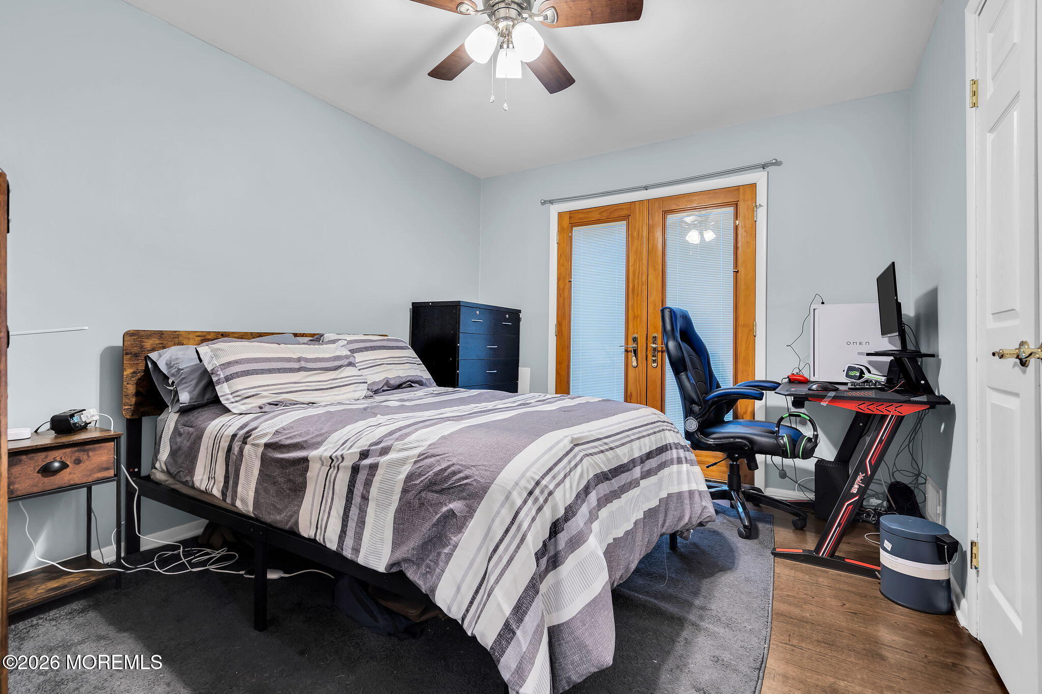 26 North Westfield Road Howell, NJ 07731 - Photo 28 of 59 a bedroom with a bed and wooden floor